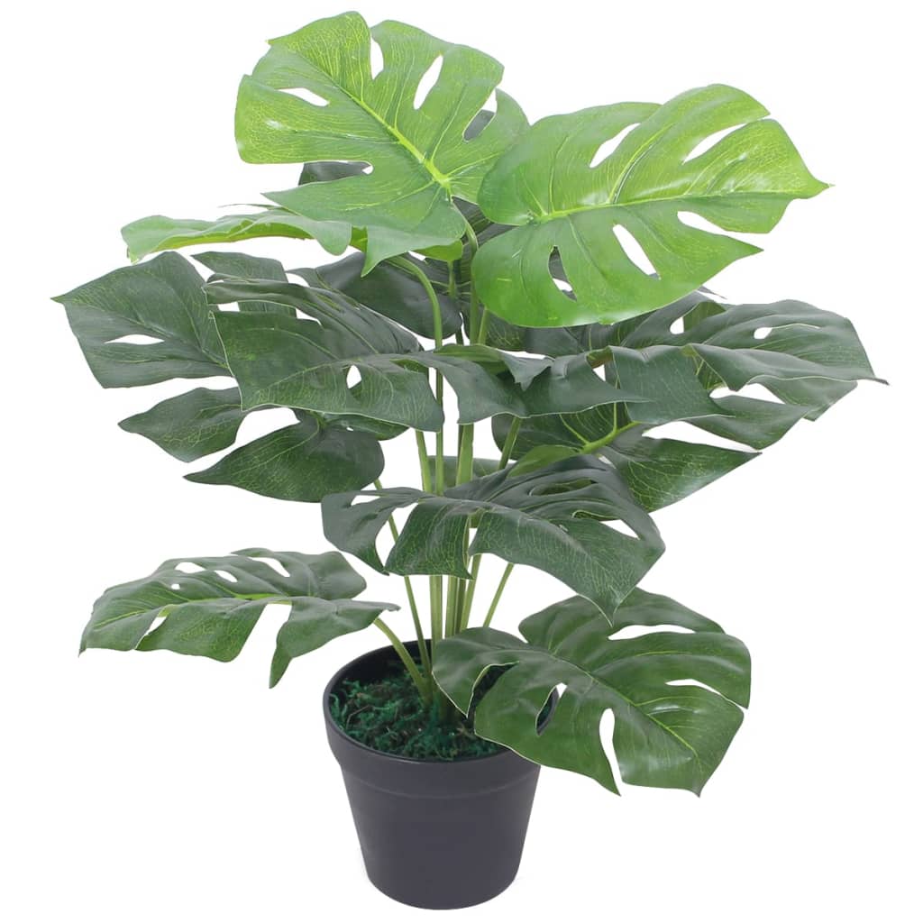 Artificial monstera plant included in the Cosy Living Pack